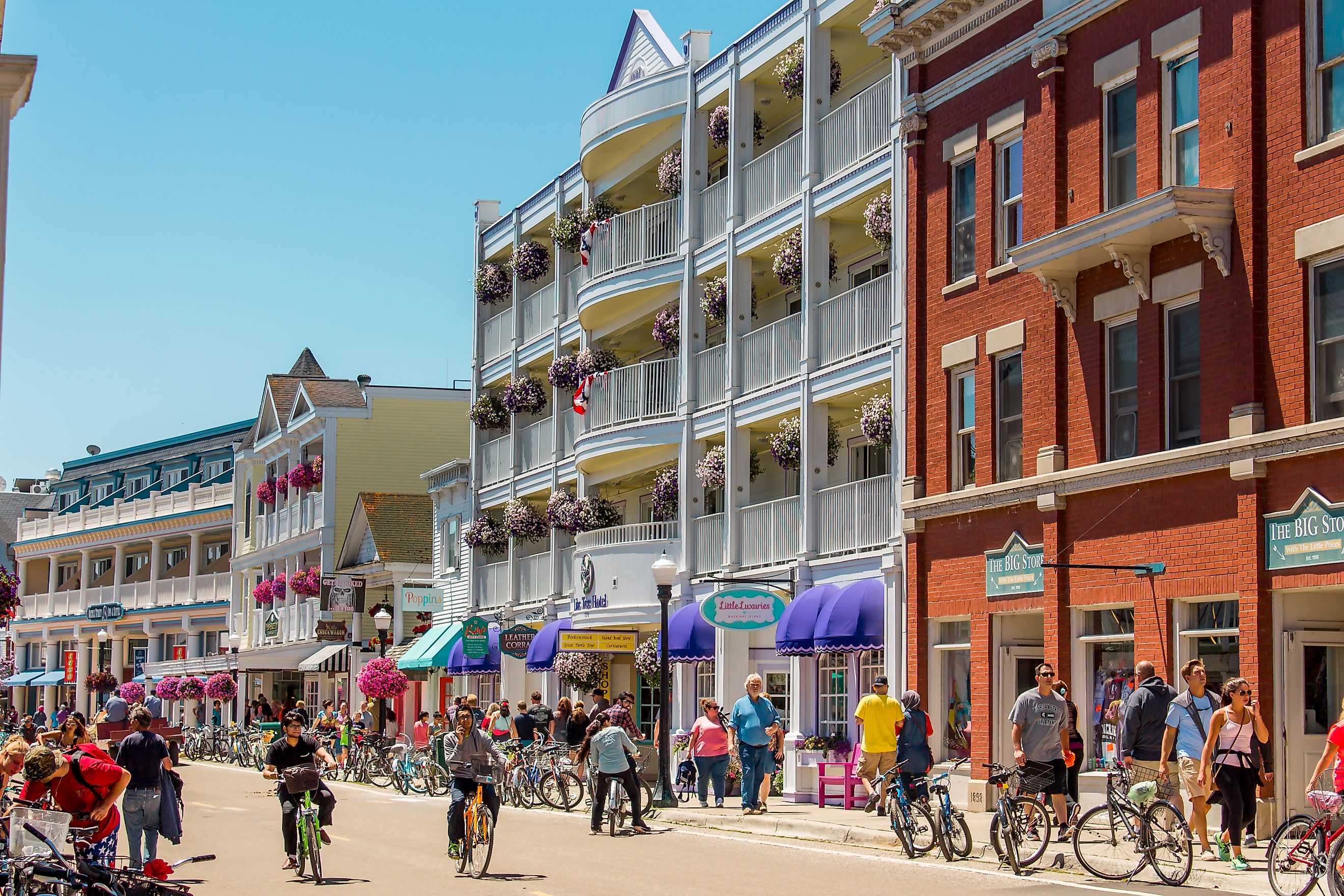 Bustling streets of downtown Mackinac Island, Michigan, during tourist season. Editorial credit: Michael Deemer / Shutterstock.com