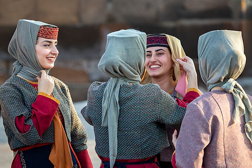 Armenian women in national costumes in Yerevan, Armenia. Image Credit MehmetO via Shutterstock.