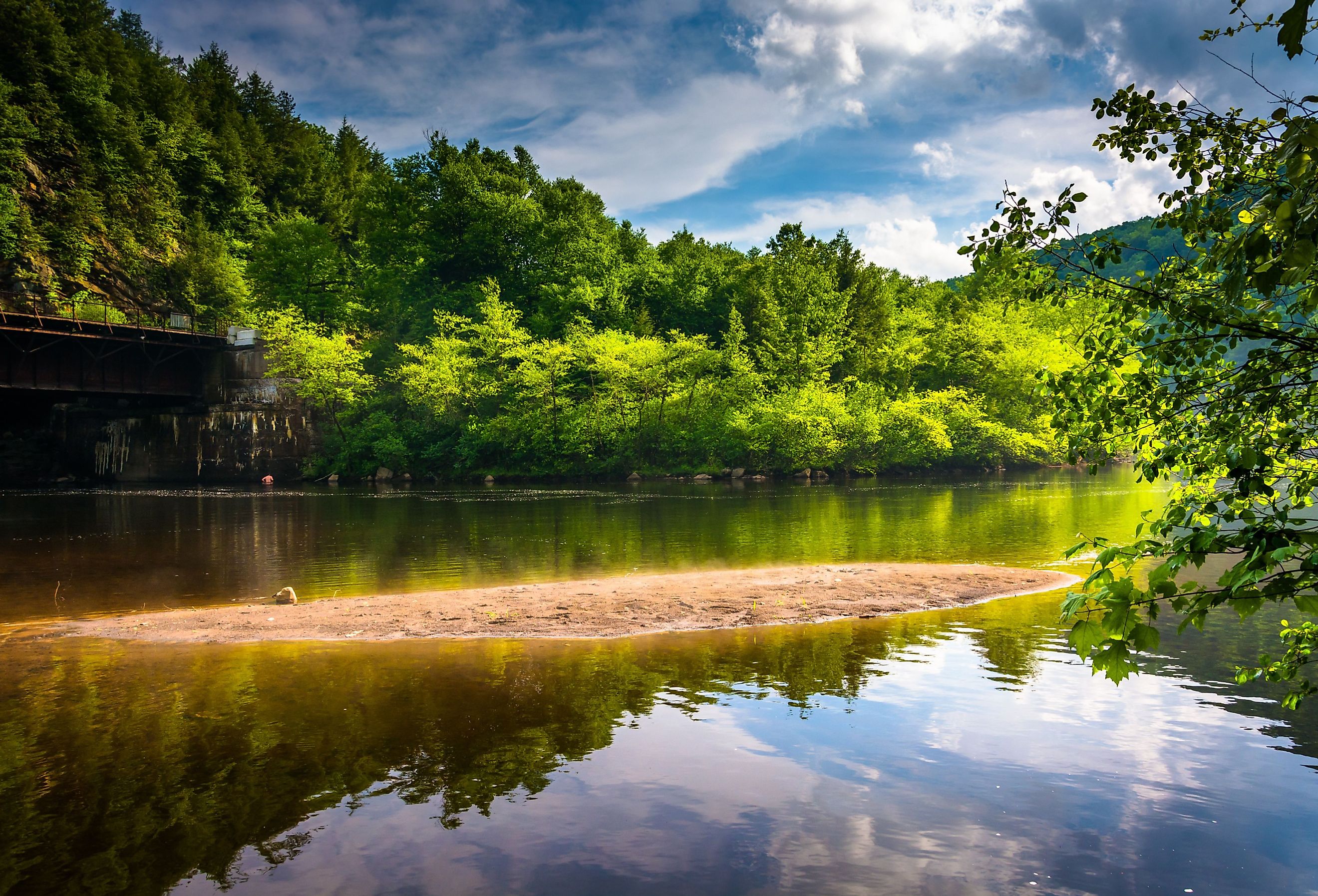 Evening clouds reflections in the Lehigh River, at Lehigh Gorge State Park, Pennsylvania.